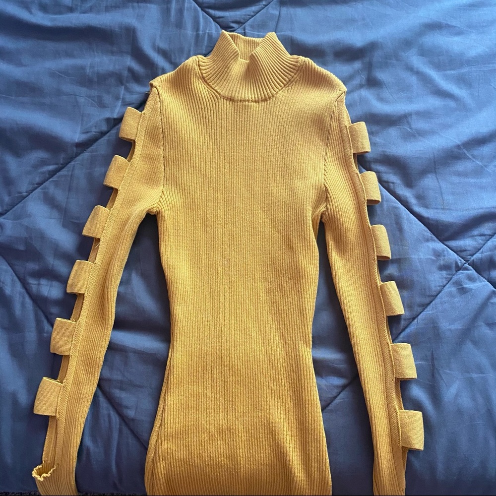 yellow sweater